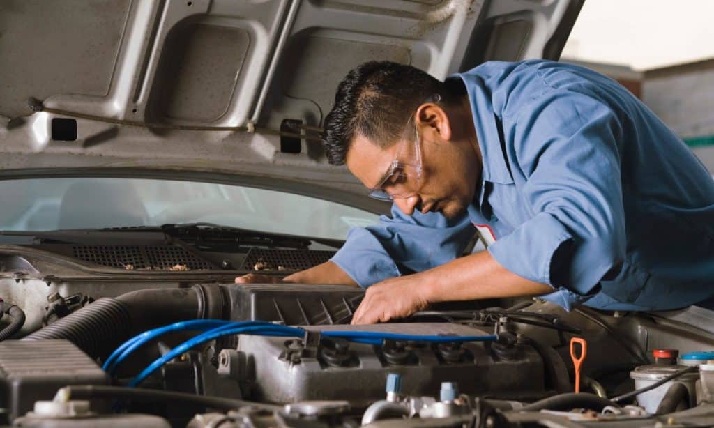 Mechanic checking the engine